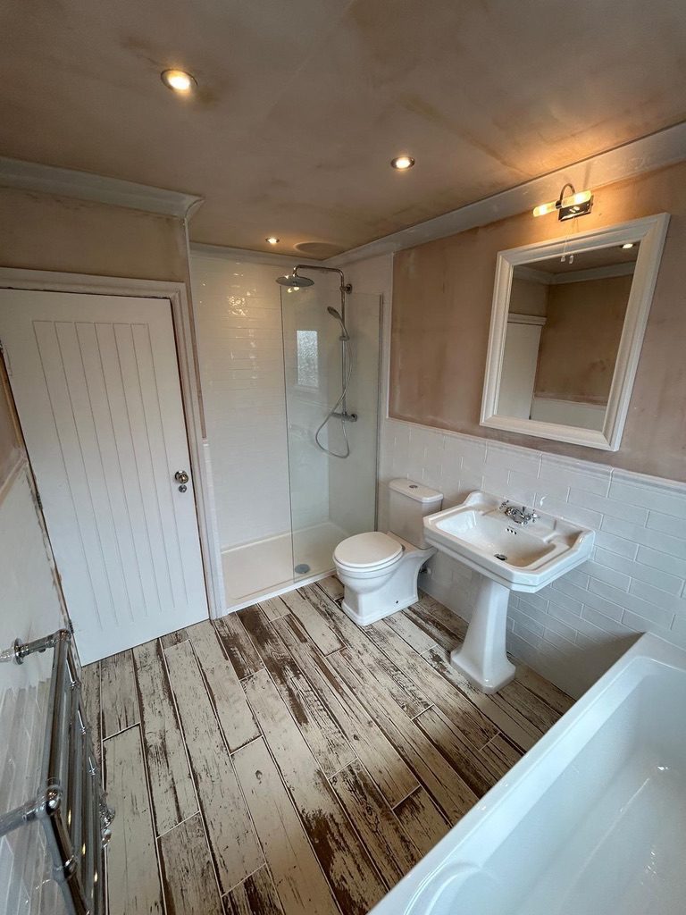 Walk in Show fitter during bathroom renovation in Leeds Walk in Show fitter during bathroom renovation in Leeds